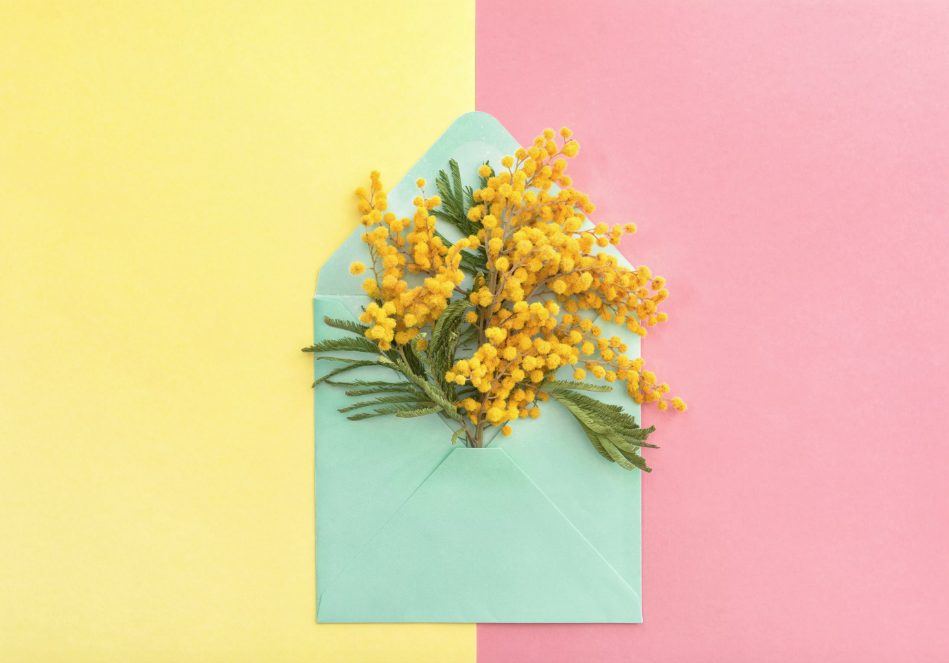 Colorful envelope with flowers inside